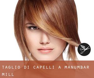 Taglio di capelli a Manumbar Mill